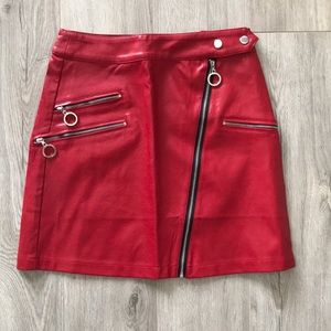Red zip up faux leather skirt from Akira